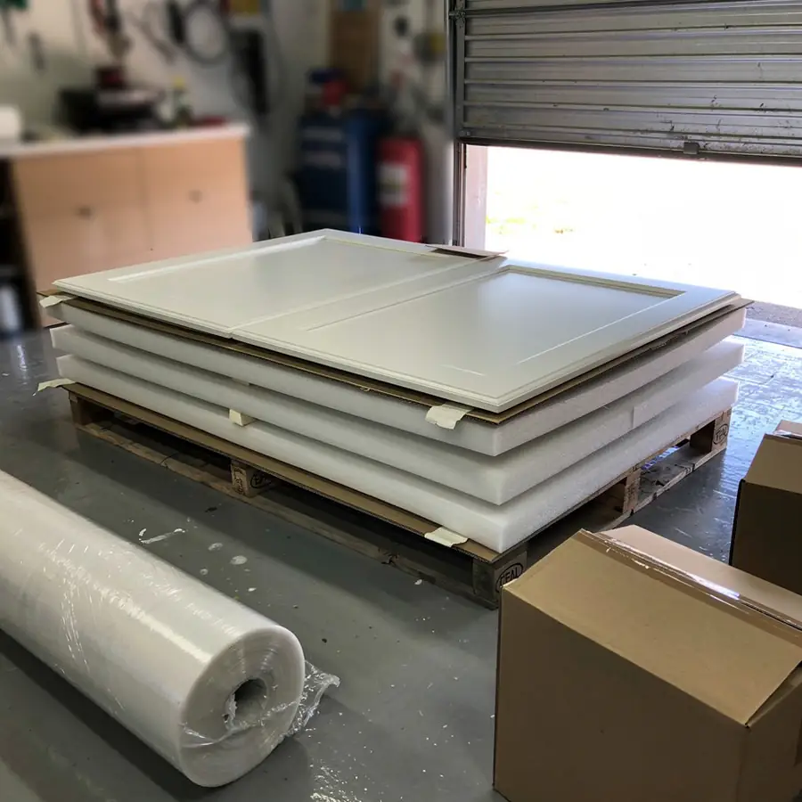 Finished cabinet doors stacked for customer pickup