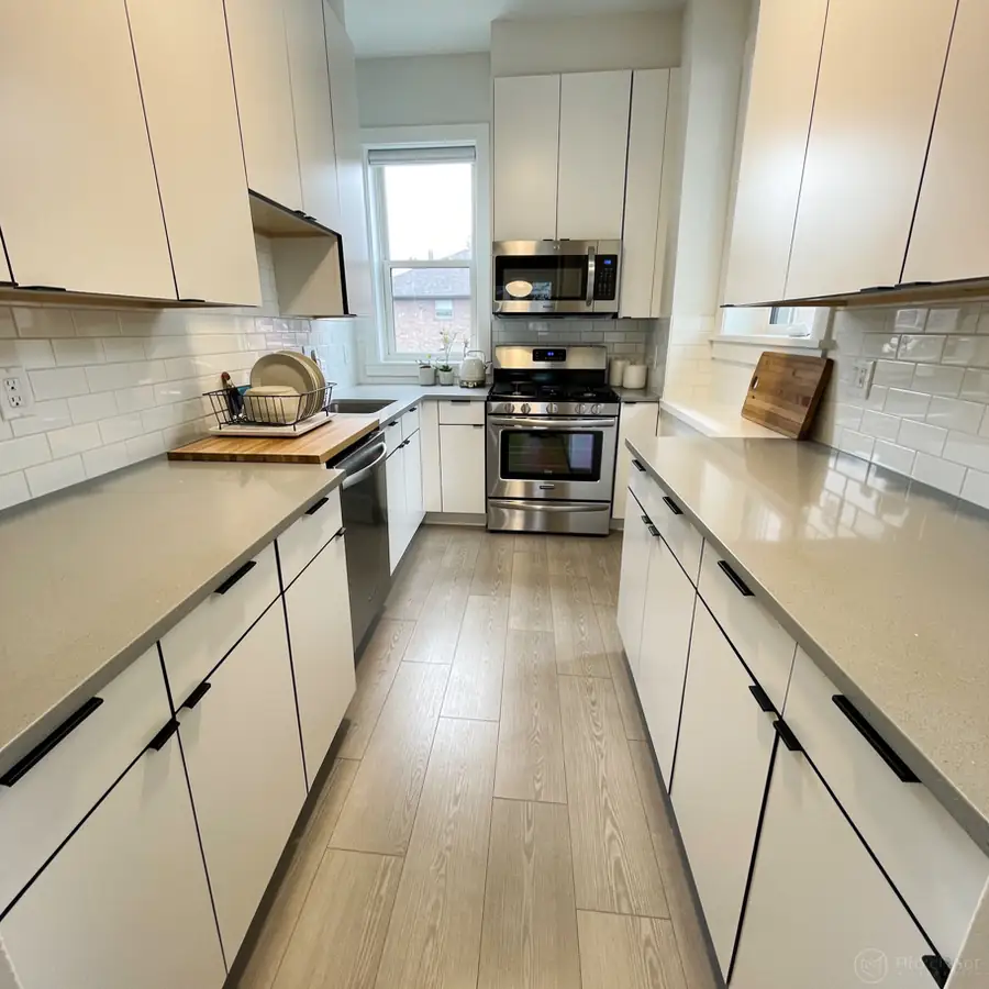 Freshly painted slab doors in condo galley