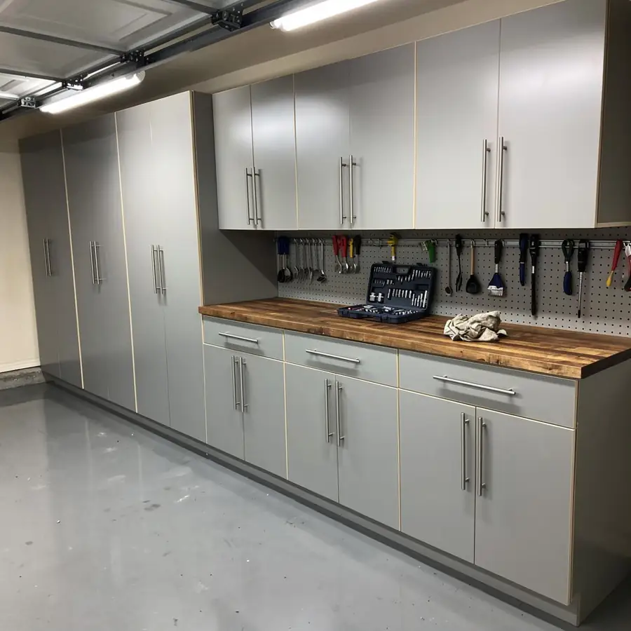 Light grey sealed plywood garage cabinets