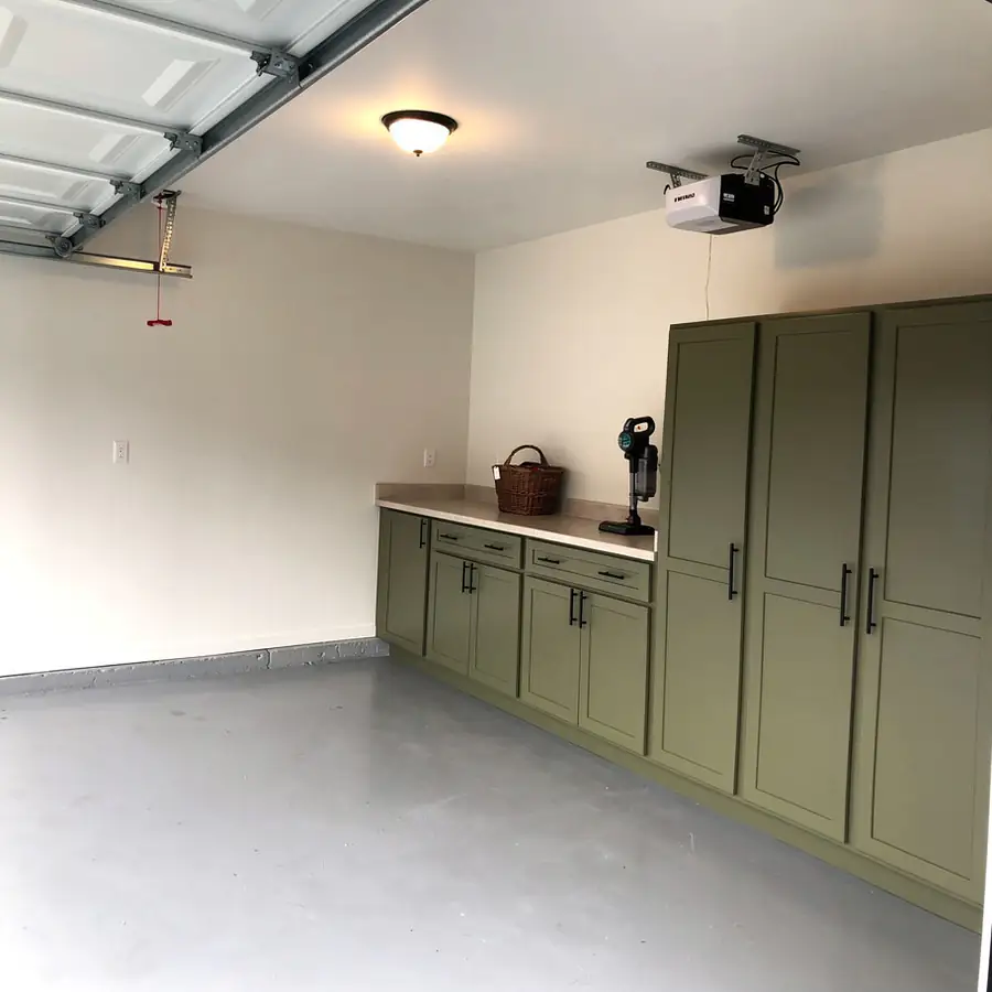 Olive green cabinets in heated garage