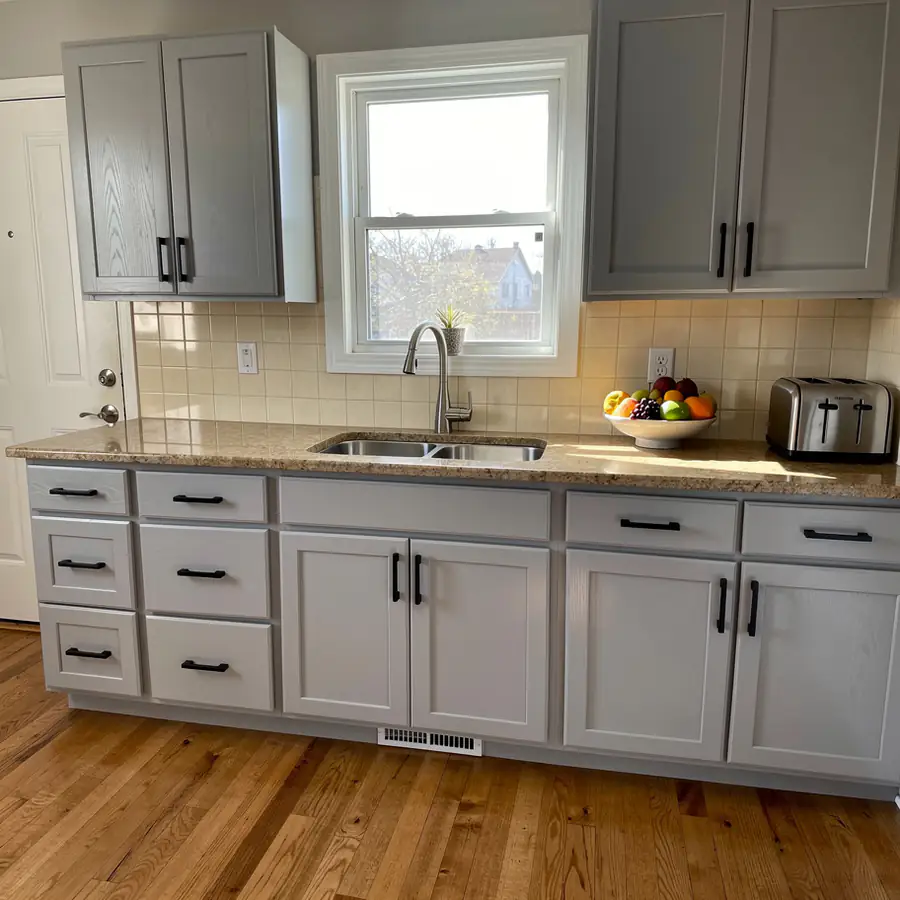 Original maple cabinets repainted dove grey