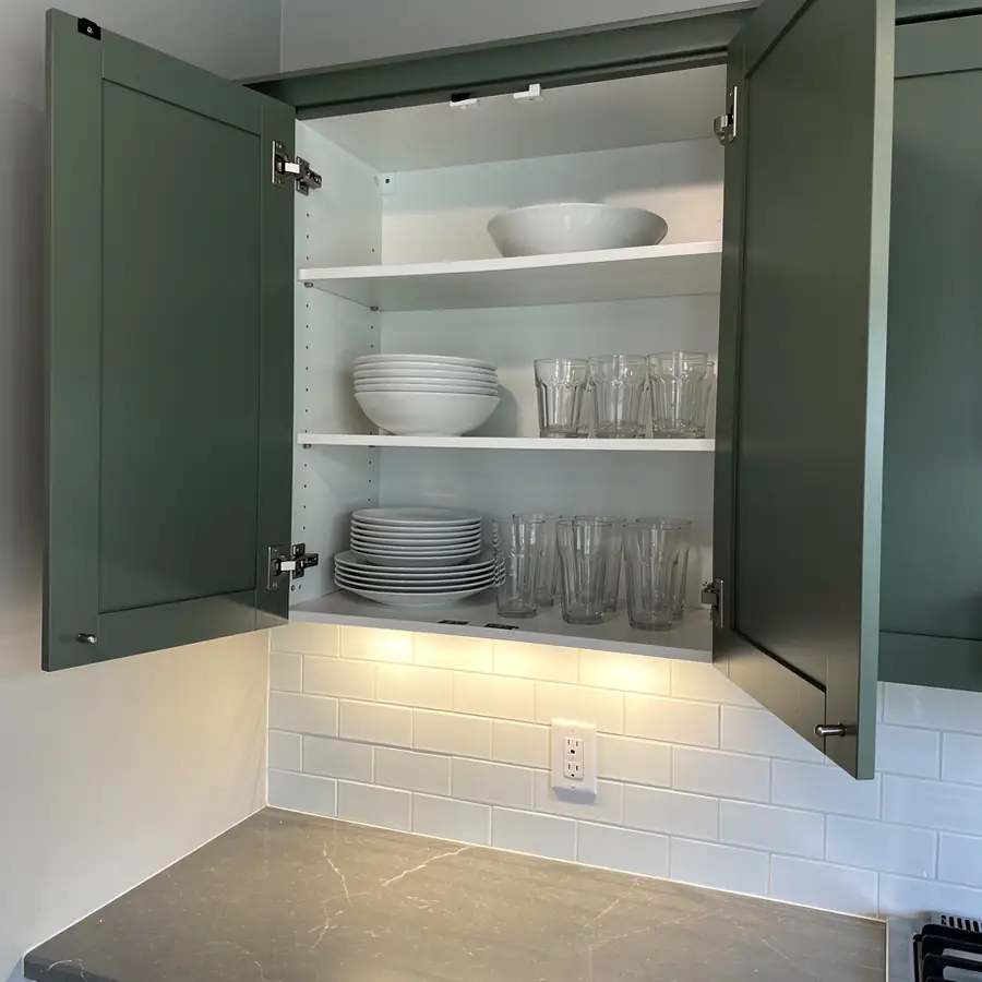 Painted cabinet interior with soft-close hinges