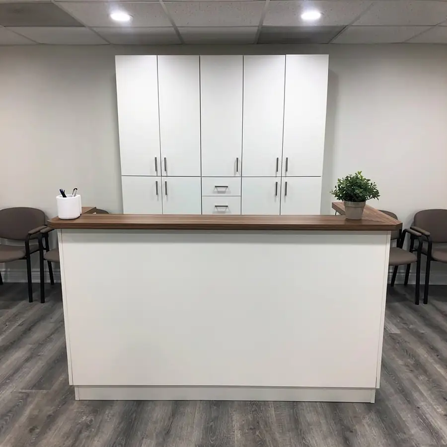 Painted dental clinic reception millwork