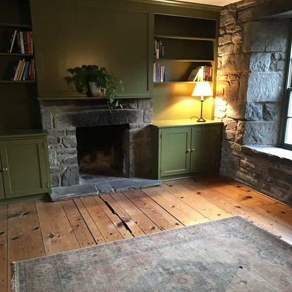 Painted fireplace built-ins in Rockwood stone home
