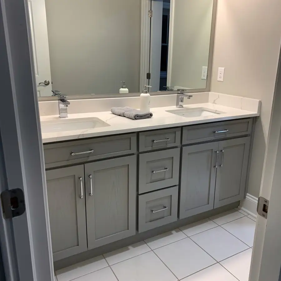 Painted grey bathroom vanity in Cambridge home