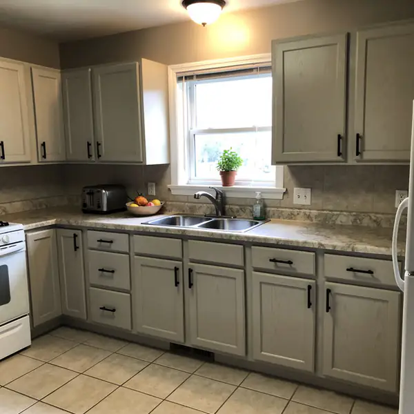 Painted oak kitchen cabinets in Acton home