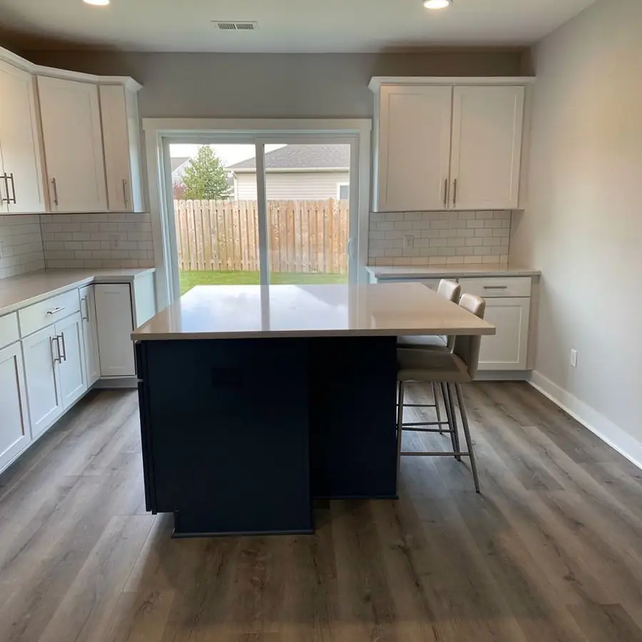 Repainted builder grade kitchen in Breslau Repainted builder grade kitchen in Breslau