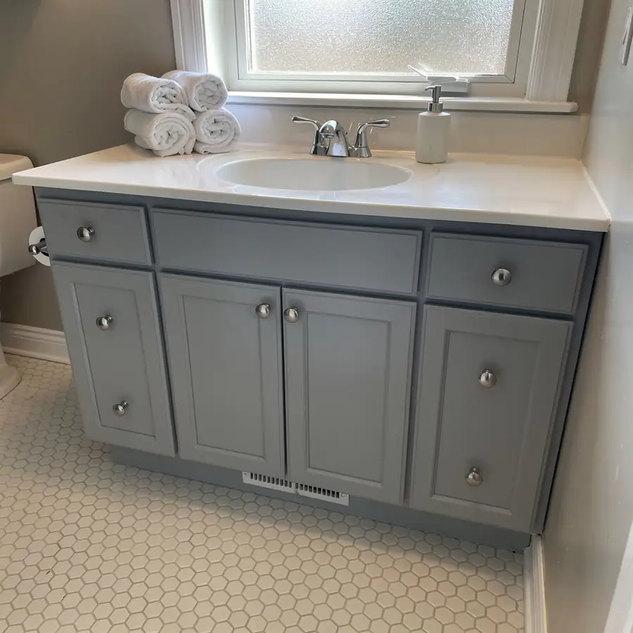 Repaired and painted bathroom vanity in Cambridge Repaired and painted bathroom vanity in Cambridge