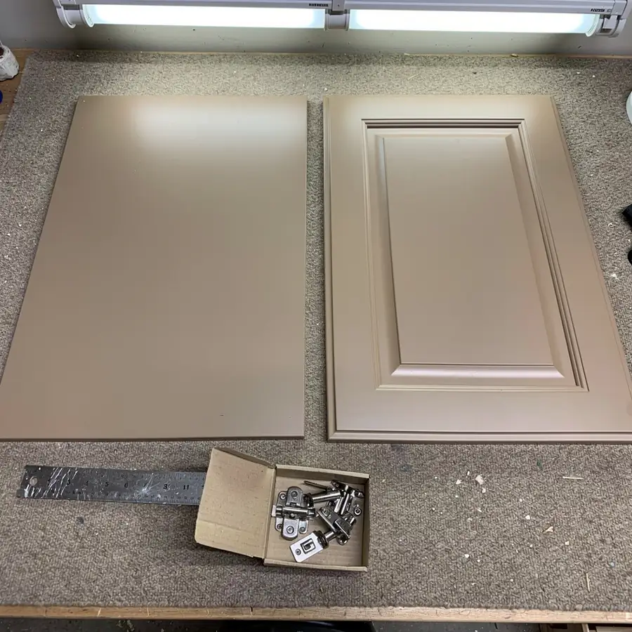 Sprayed slab and raised panel doors