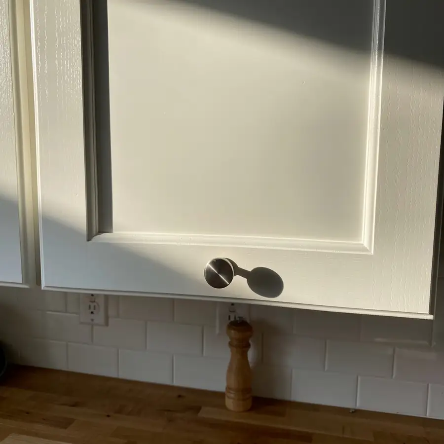 Sprayed white Shaker door in window light