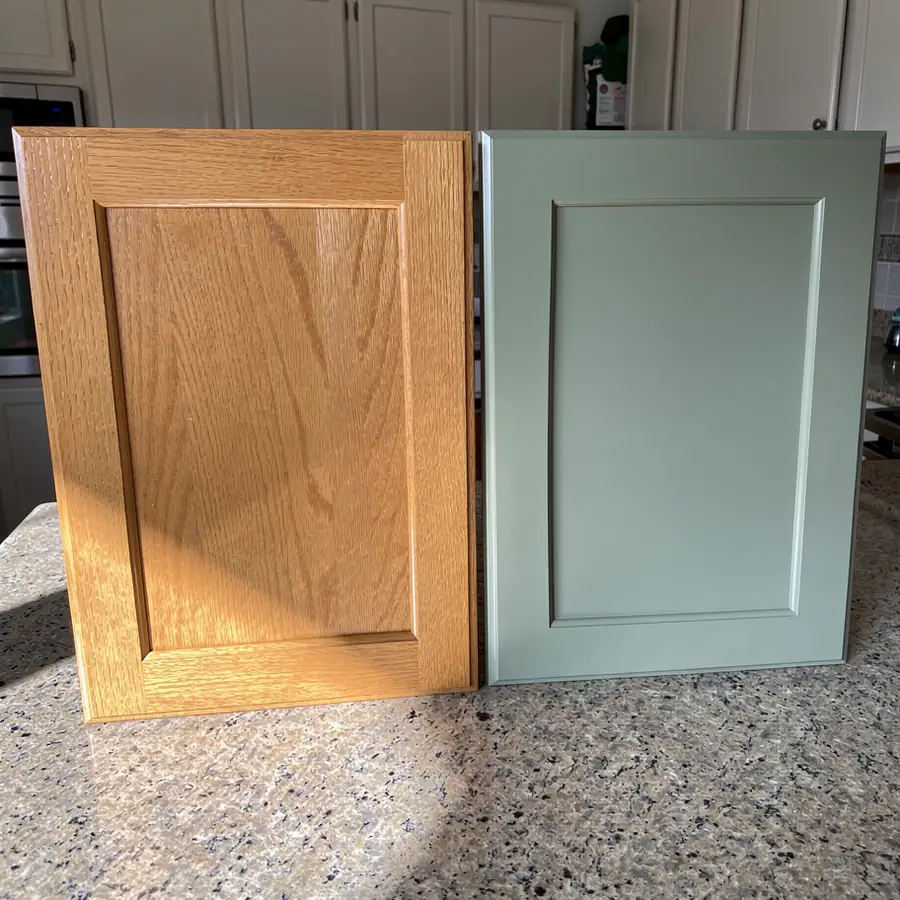 Stained oak beside painted cabinet door
