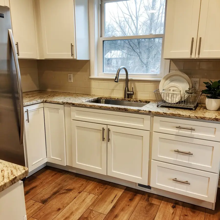 Swiss Coffee cabinets in north facing kitchen