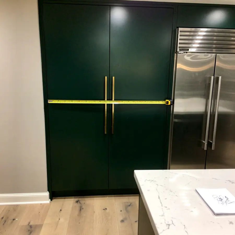 Tape measure on sprayed pantry door