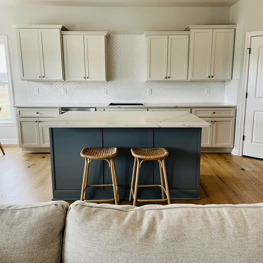 Two-tone kitchen with smoky blue island Two-tone kitchen with smoky blue island