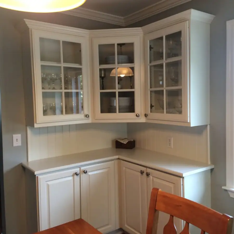 White painted dining hutch with glass doors White painted dining hutch with glass doors